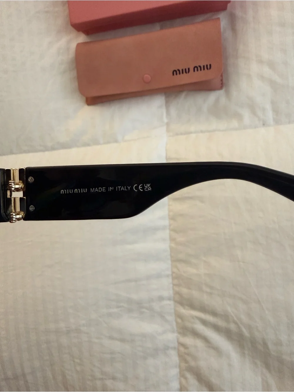 Miu Miu Black Oval Sunglasses with Pink Branded Case and Box